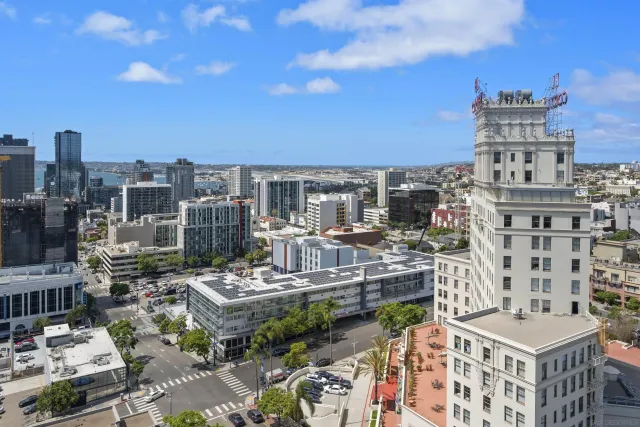 a view of a city with tall buildings