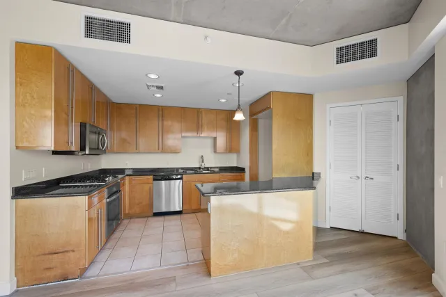 a view of a hallway with washer and dryer