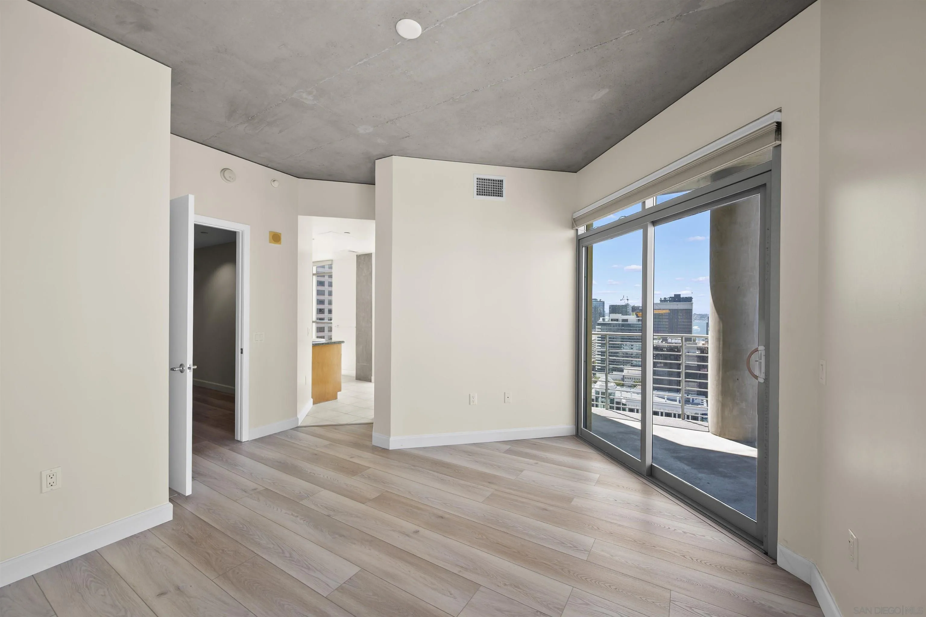 801 Ash Street, Unit 1701 San Diego, CA 92101 - Photo 37 of 44 a view of a room with wooden floor
