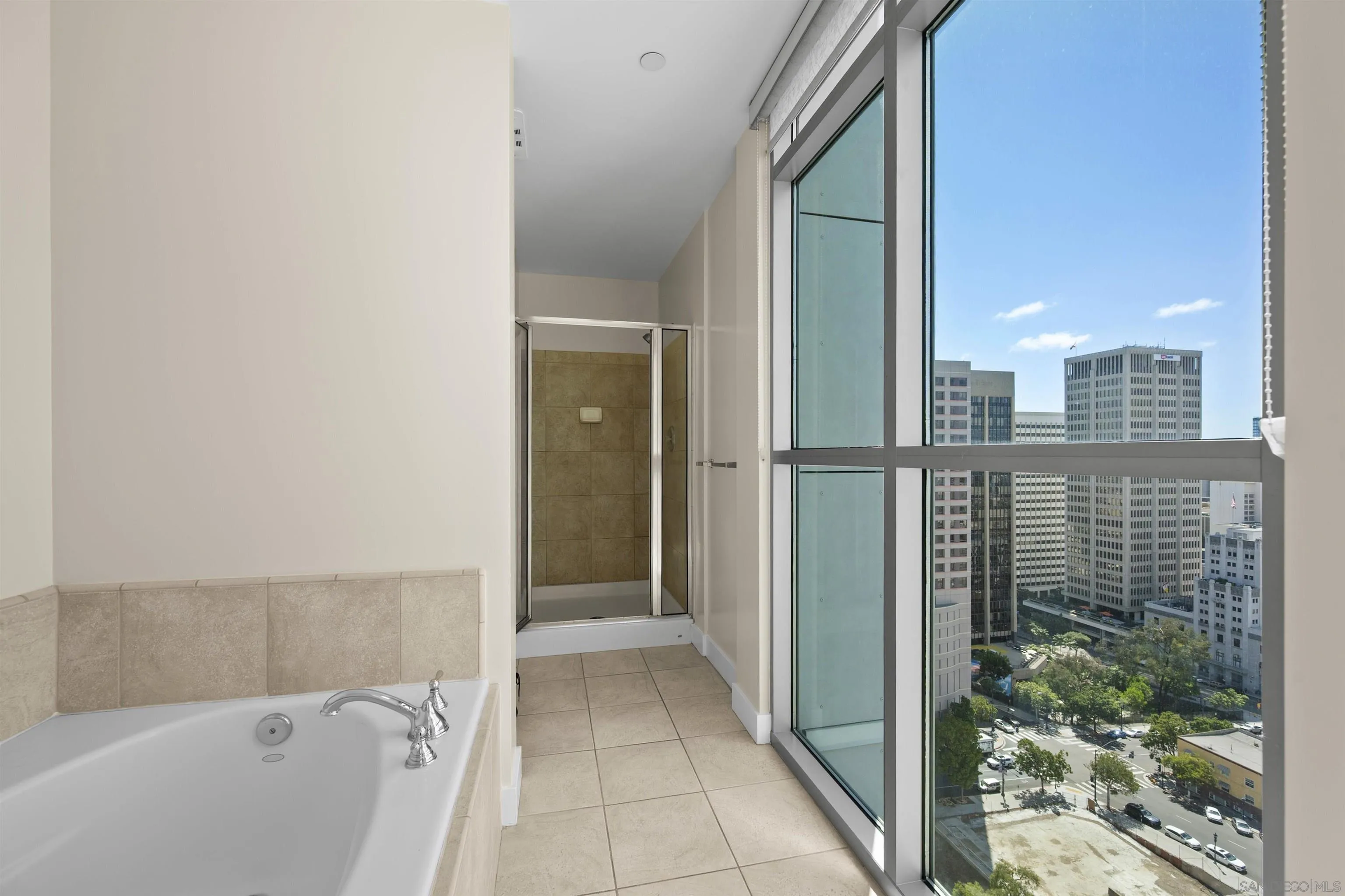 801 Ash Street, Unit 1701 San Diego, CA 92101 - Photo 40 of 44 a bathroom with a bathtub and a shower