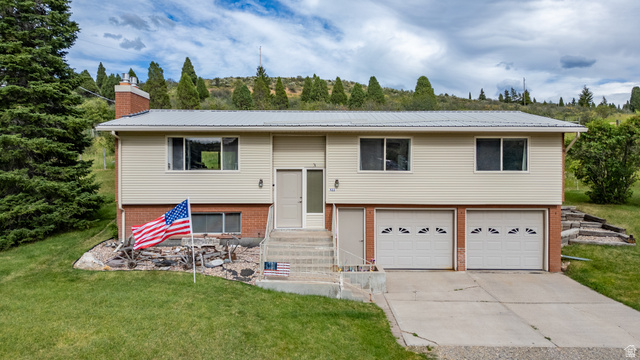 322 Bailey Creek Road Soda Springs, ID 83276 - Photo 1 of 32 Split-level residence featuring light-colored siding and brick accents