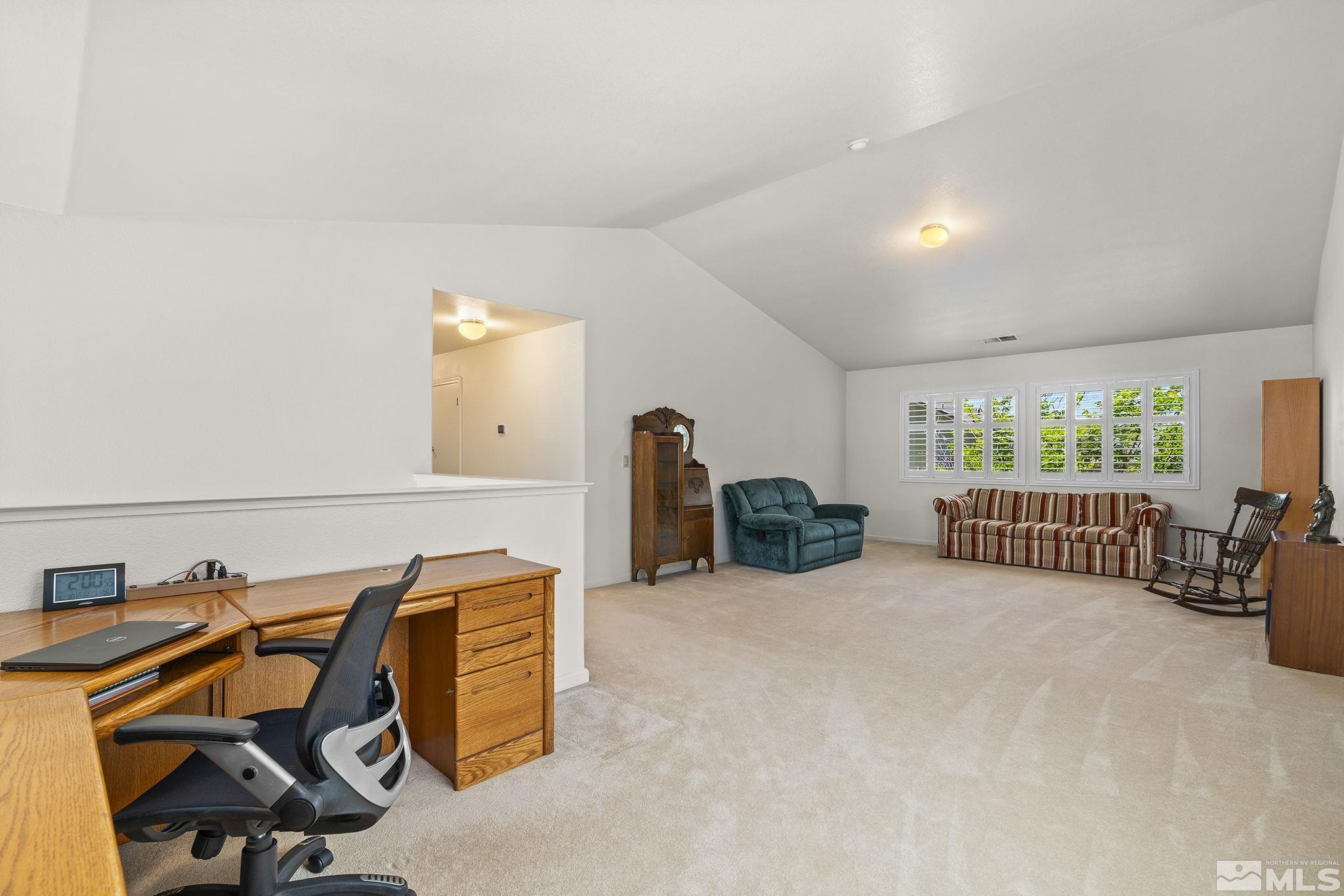 3310 Snake River Drive Reno, NV 89503 - Photo 16 of 33 a view of a livingroom with furniture and windows