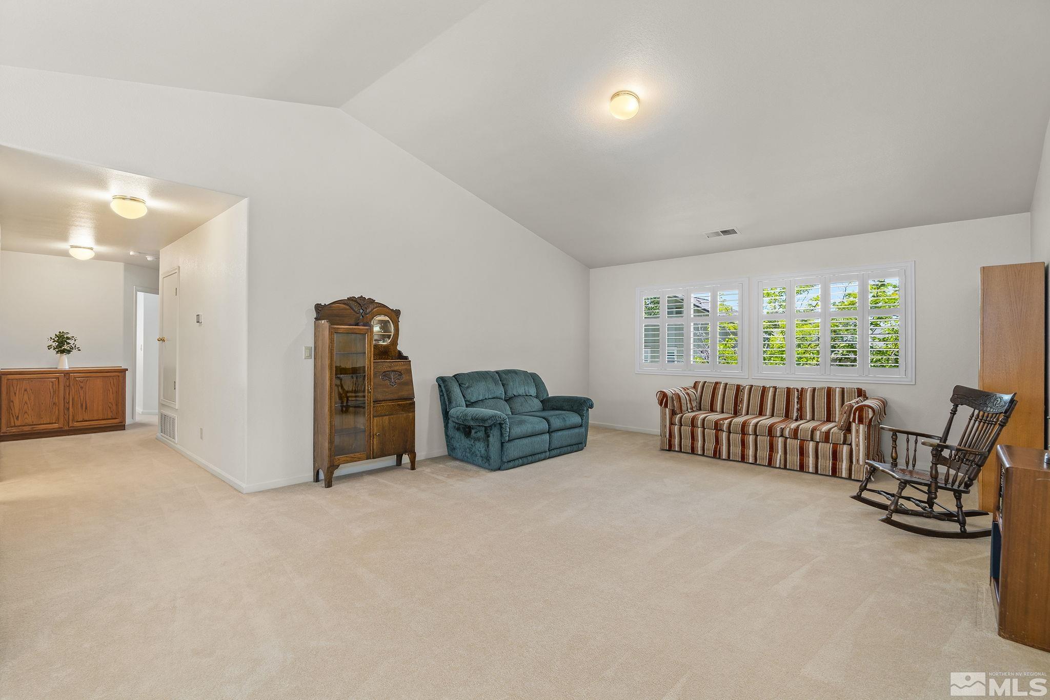 3310 Snake River Drive Reno, NV 89503 - Photo 18 of 33 a view of a bedroom with furniture and window