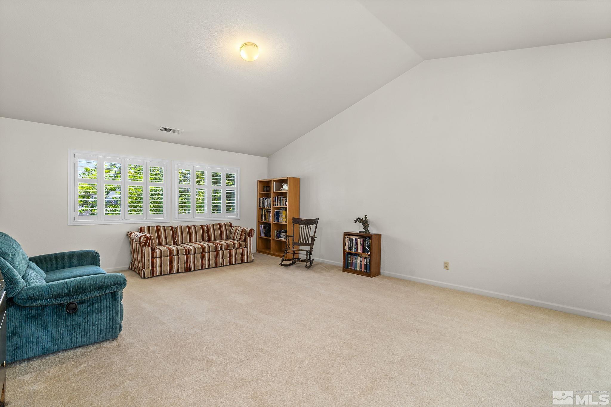 3310 Snake River Drive Reno, NV 89503 - Photo 19 of 33 an empty room with furniture and a window