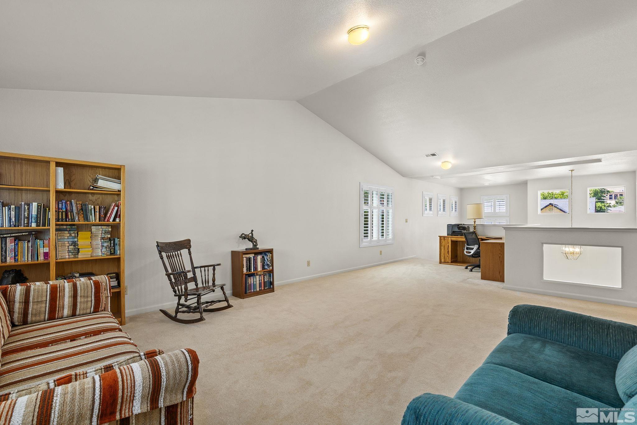 3310 Snake River Drive Reno, NV 89503 - Photo 20 of 33 a bedroom with furniture and a couch