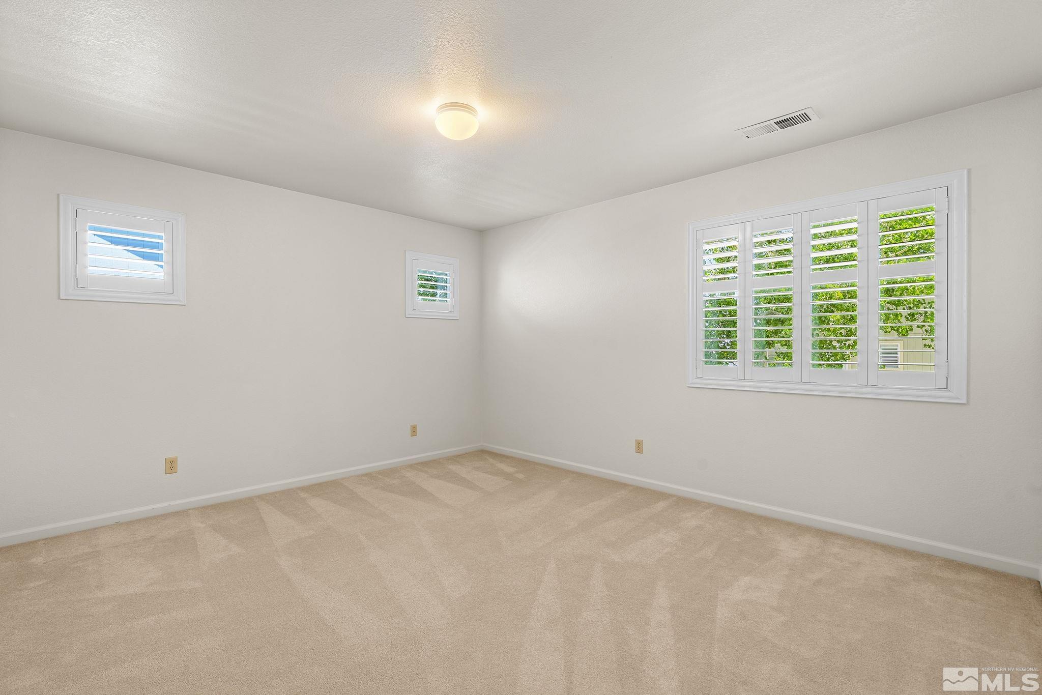 3310 Snake River Drive Reno, NV 89503 - Photo 22 of 33 an empty room with a window