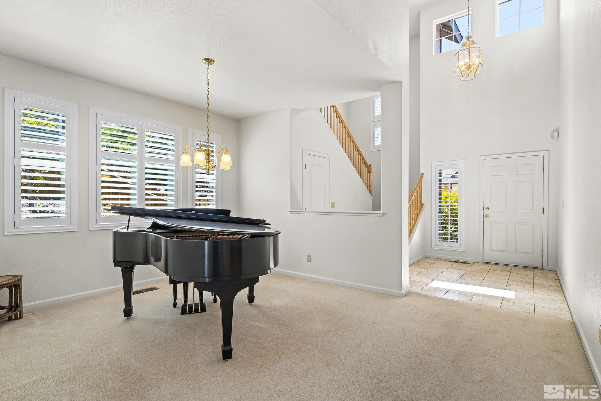 3310 Snake River Drive Reno, NV 89503 - Photo 8 of 33 a view of a workspace with furniture and a window