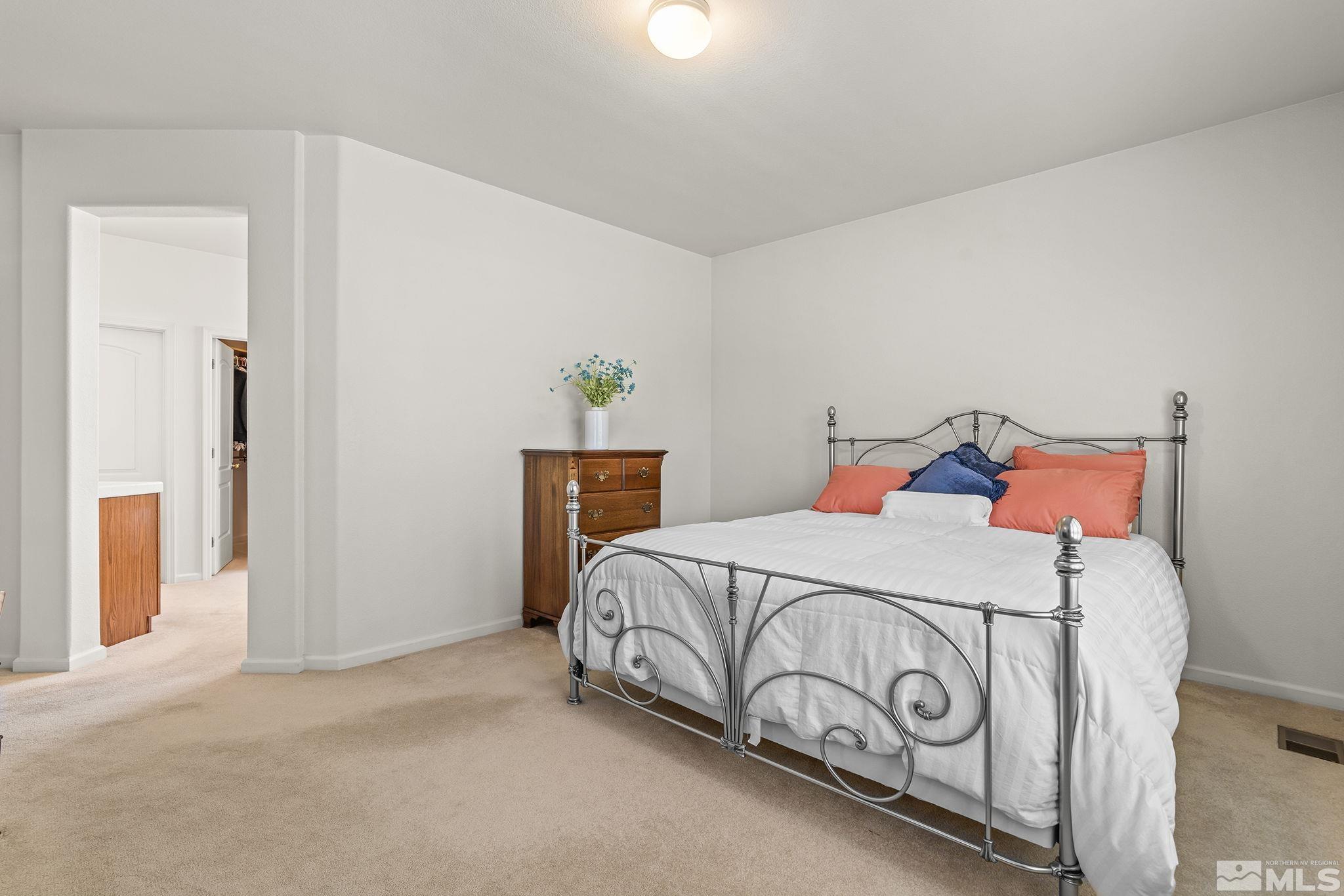 3310 Snake River Drive Reno, NV 89503 - Photo 10 of 33 a bedroom with a bed and a window