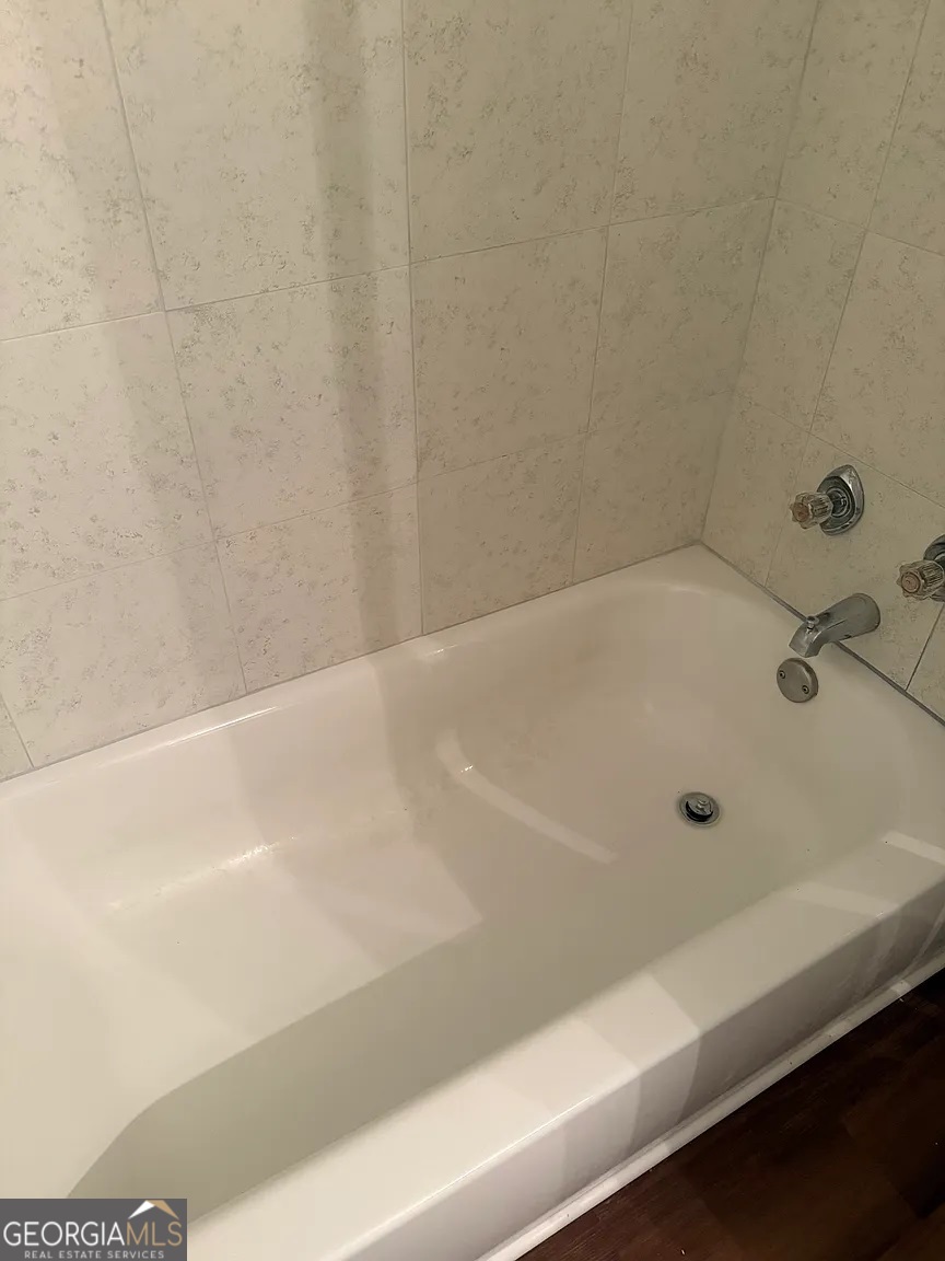 4534 Golf Vista Circle Decatur, GA 30035 - Photo 12 of 17 Separate tub area in the primary bath for added privacy and functionality.