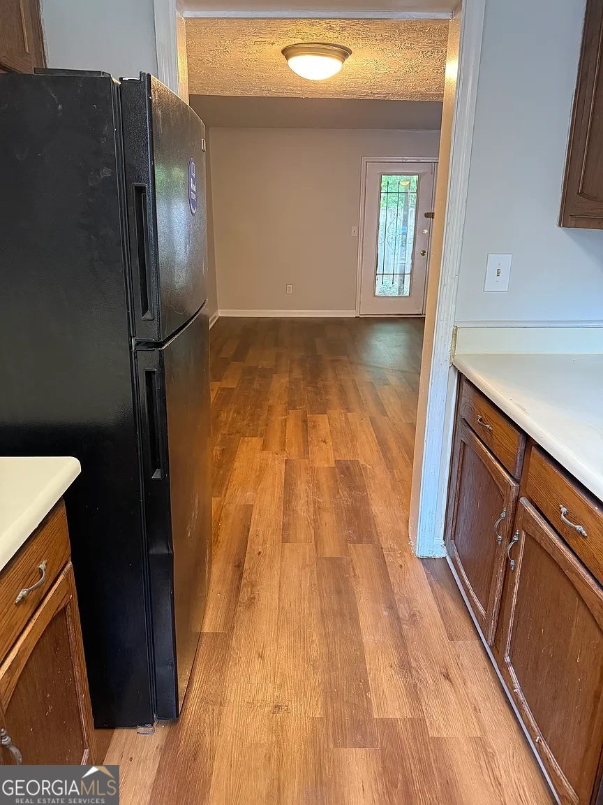 4534 Golf Vista Circle Decatur, GA 30035 - Photo 7 of 17 Large window over the sink provides natural light and a pleasant backyard view.