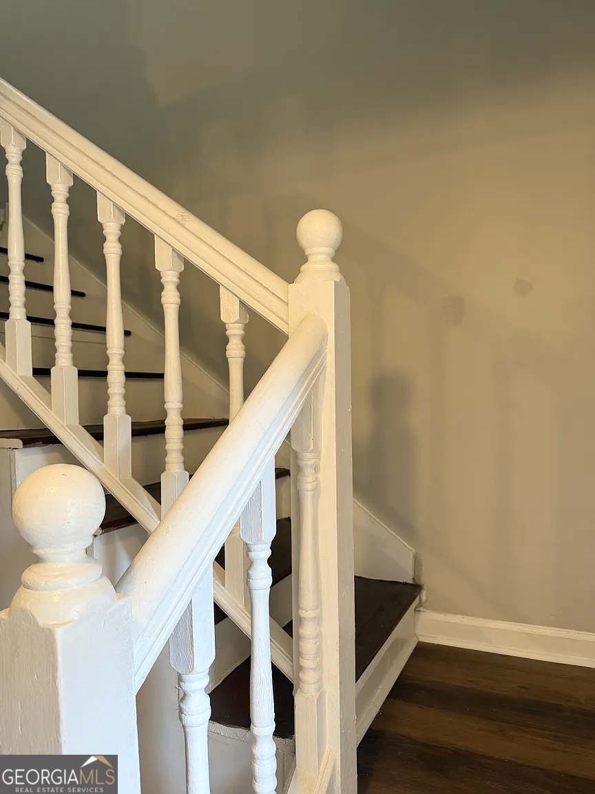 4534 Golf Vista Circle Decatur, GA 30035 - Photo 9 of 17 Freshly painted stairway leading to the upper-level bedrooms and full baths.
