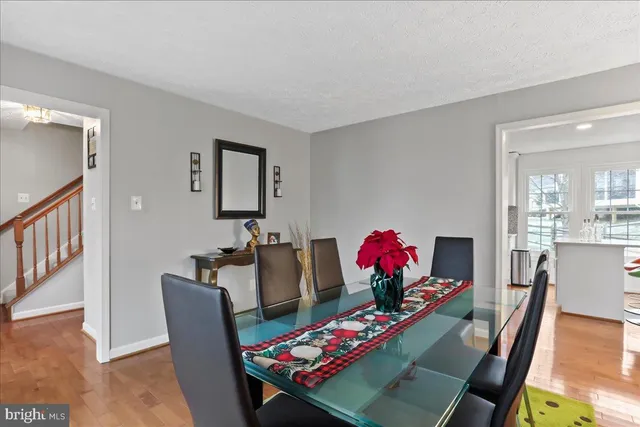 a workspace with furniture and a potted plant