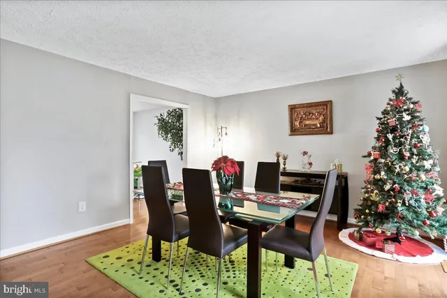 a kitchen with sink and refrigerator