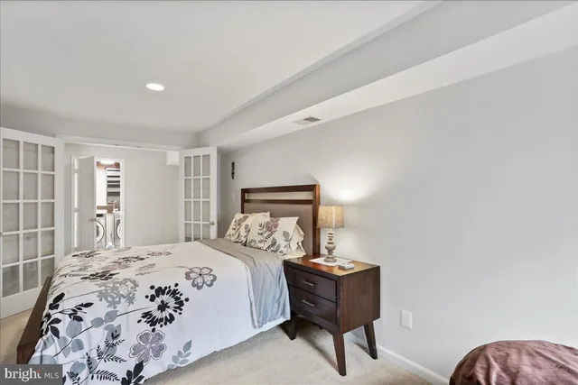 a utility room with sink dryer and washer