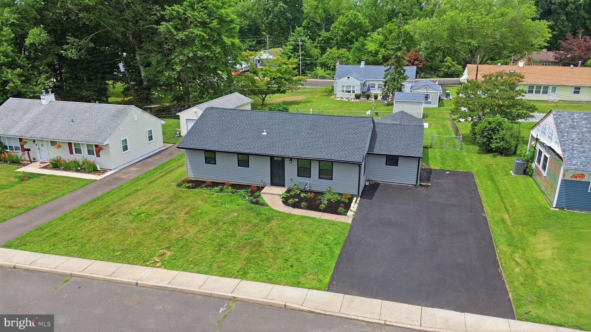 349 Andover Road Fairless Hills, PA 19030 - Photo 43 of 43 Charming home with lush green surroundings.