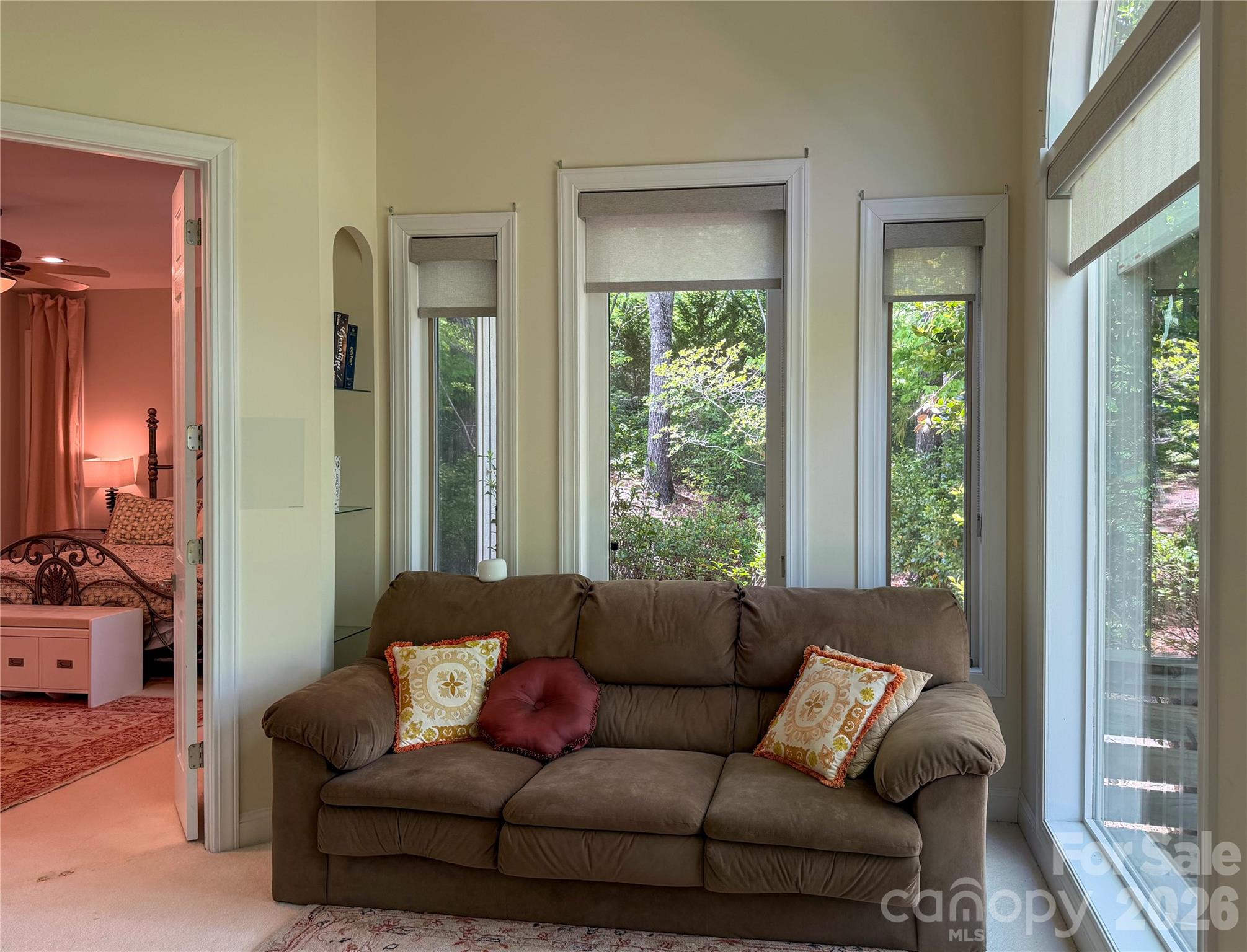 556 Quail Ridge Boulevard Lake Lure, NC 28746 - Photo 22 of 48 a living room with furniture and a window