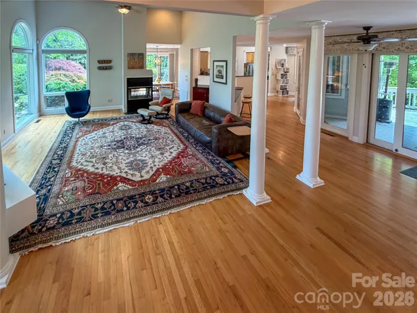 a table with chairs and painting on the wall