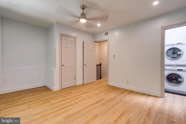 a view of a livingroom with wooden floor
