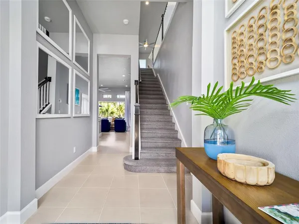 a vase of flowers sitting on a table