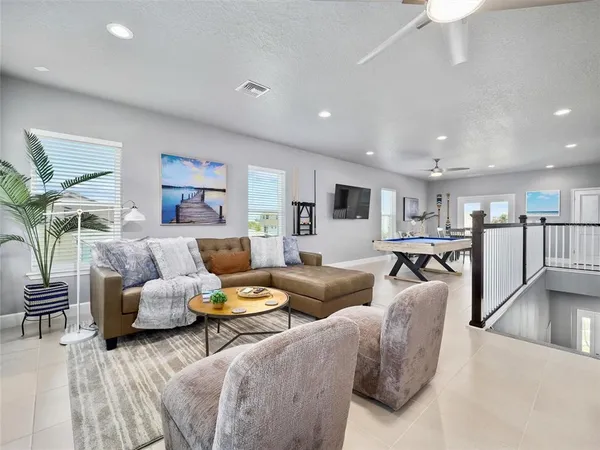 a living room with furniture and a table