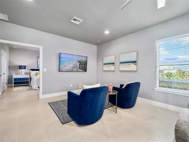 a living room with furniture and a window