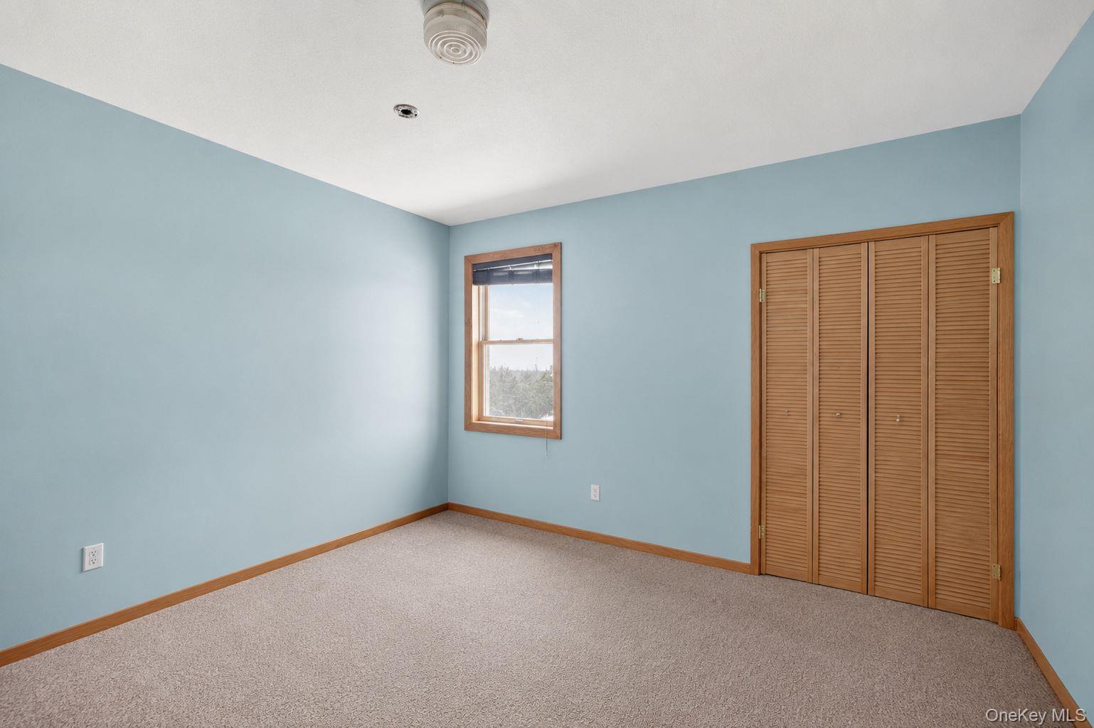282 West Shore Road Bethel, NY 12783 - Photo 19 of 32 a view of an empty room with a window