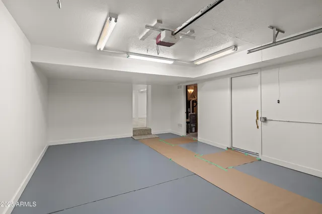 an empty room with a workbench