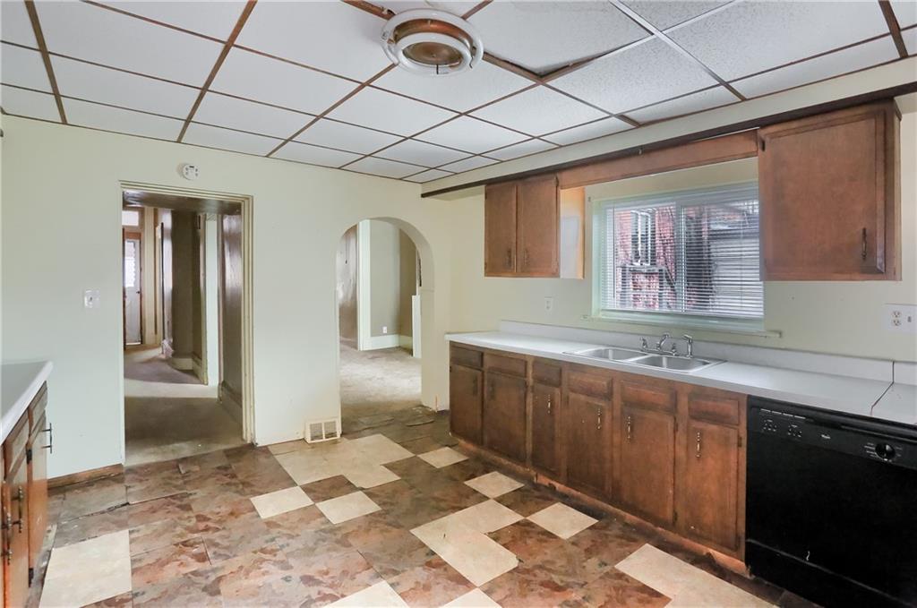 116 Hemlock Street Pittsburgh, PA 15212 - Photo 12 of 38 a bathroom with a sink and a mirror