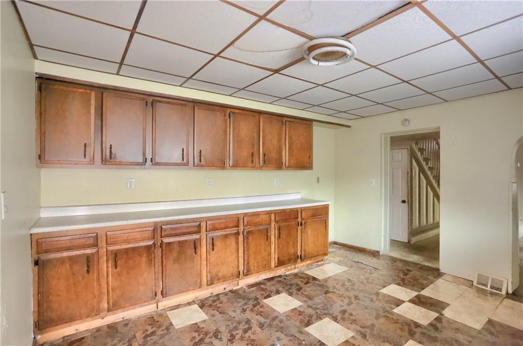 116 Hemlock Street Pittsburgh, PA 15212 - Photo 14 of 38 a view of a storage & utility room with wooden walls
