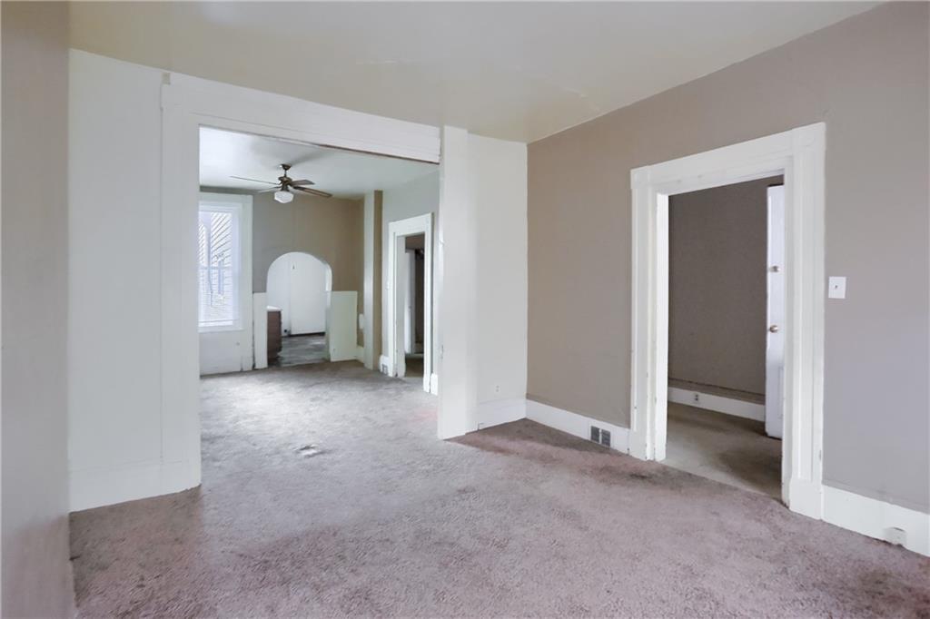 116 Hemlock Street Pittsburgh, PA 15212 - Photo 7 of 38 a view of a room that has a large window and closet