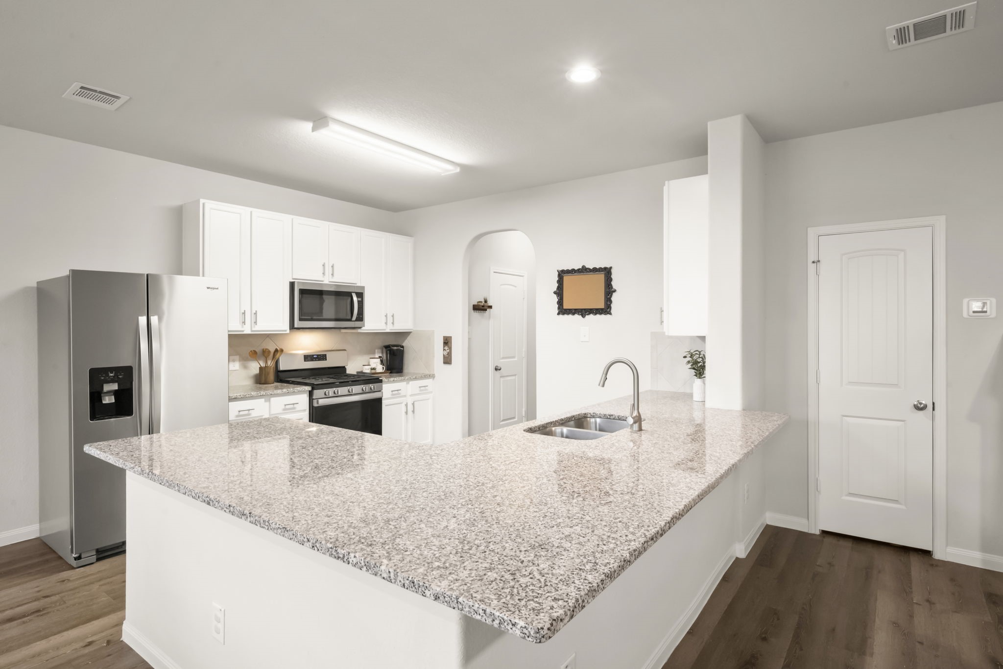 4915 Blue Jacaranda Way Spring, TX 77373 - Photo 9 of 30 The massive breakfast bar will accommodate plenty of seating.