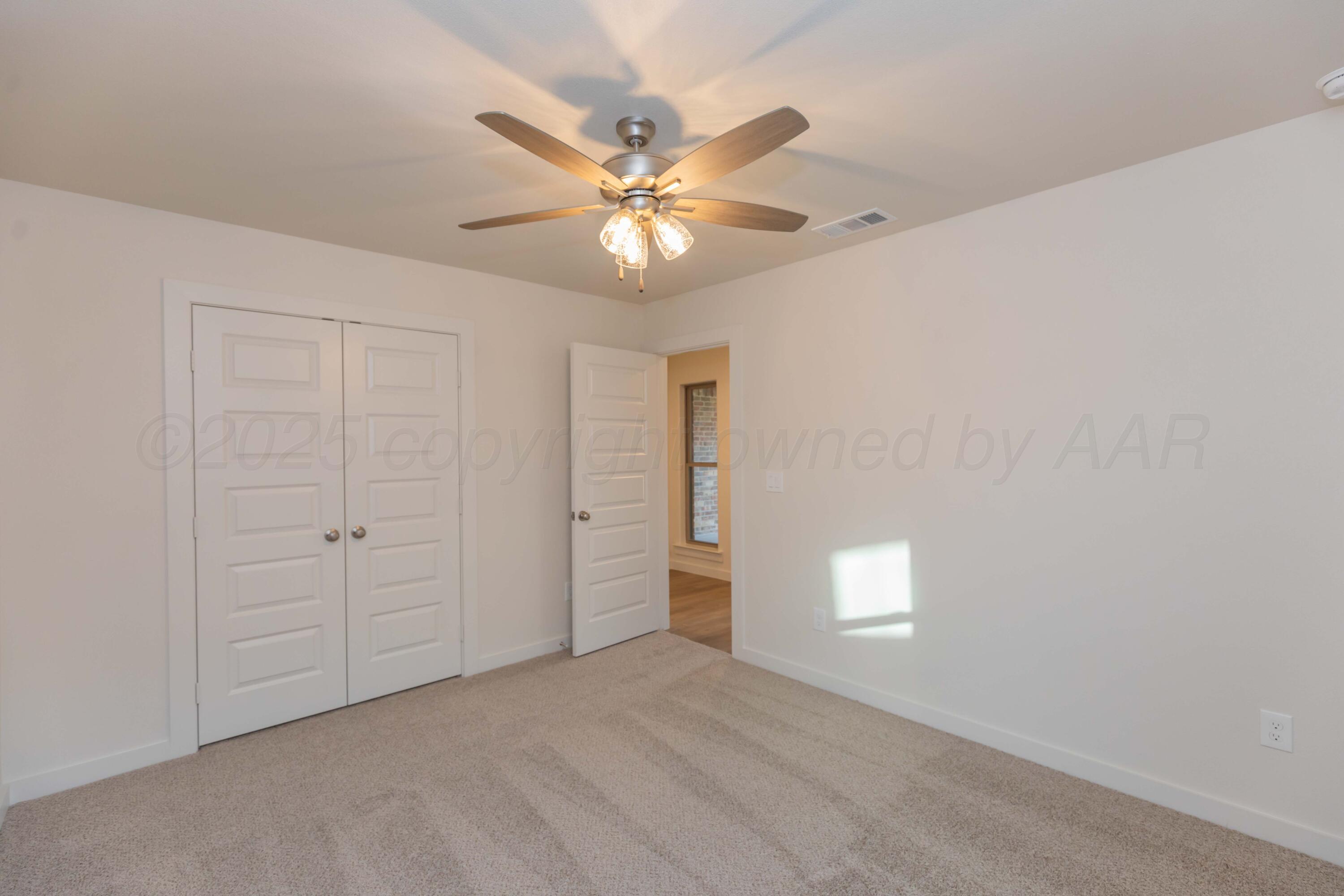 7601 Castleman Road Amarillo, TX 79119 - Photo 14 of 25 wooden floor in an empty room
