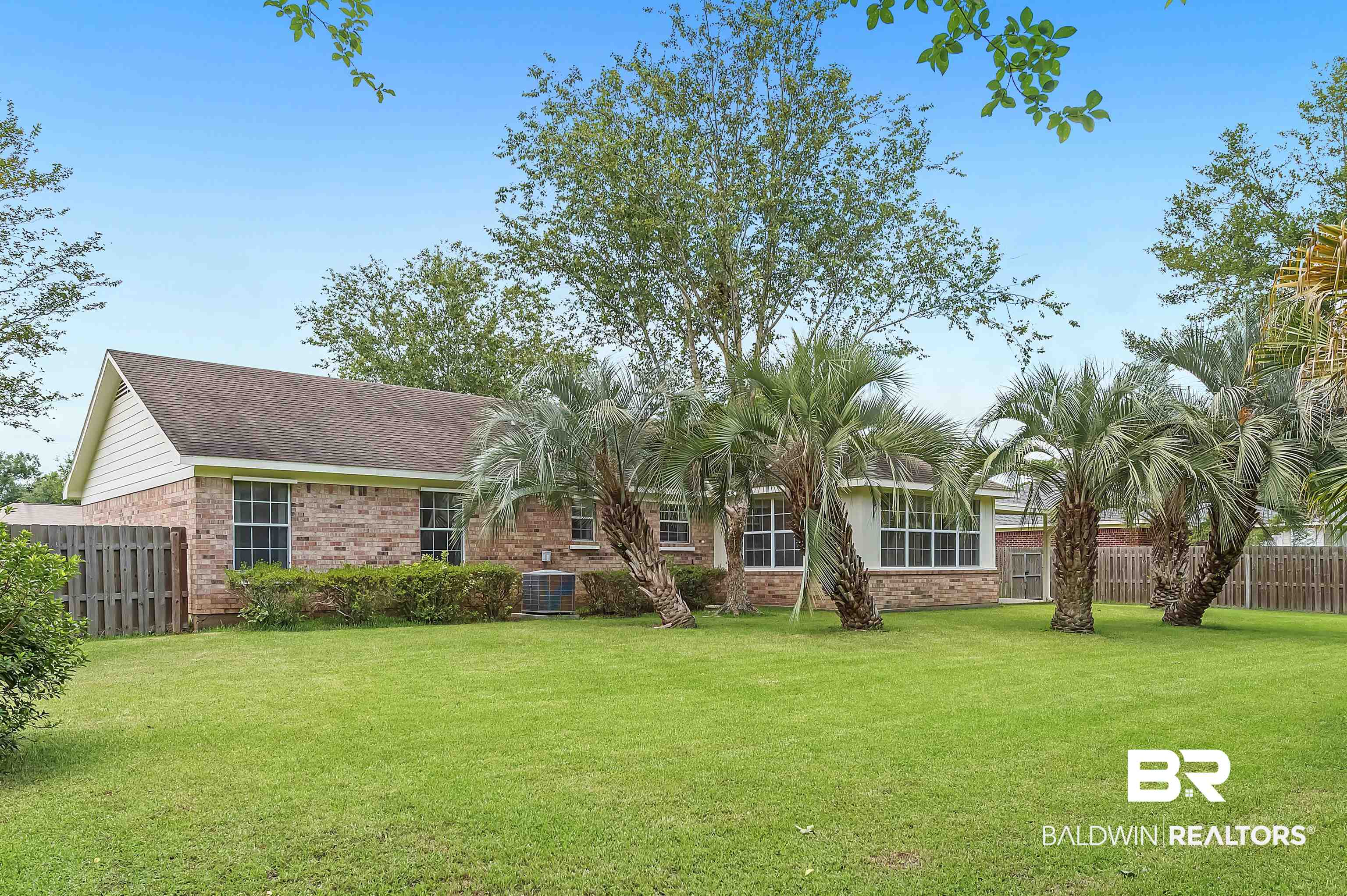 1502 Mulberry Lane Foley, AL 36535 - Photo 6 of 45 Ranch-style home featuring central AC unit and a front lawn