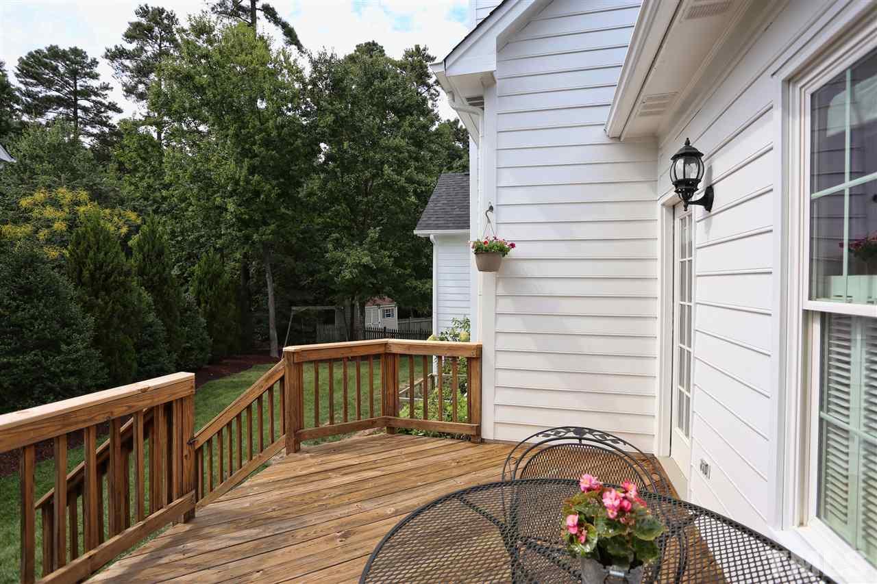 12301 Amoretto Way Raleigh, NC 27613 - Photo 22 of 25 a view of a balcony with two chairs