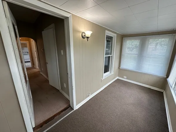 a view of a room with a bathroom