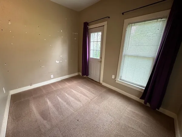 an empty room with a window