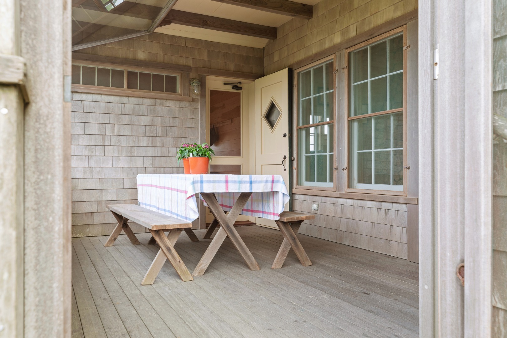 3 North Gully Road Nantucket, MA 02554 - Photo 16 of 43 a outdoor space with a couch and a potted plant