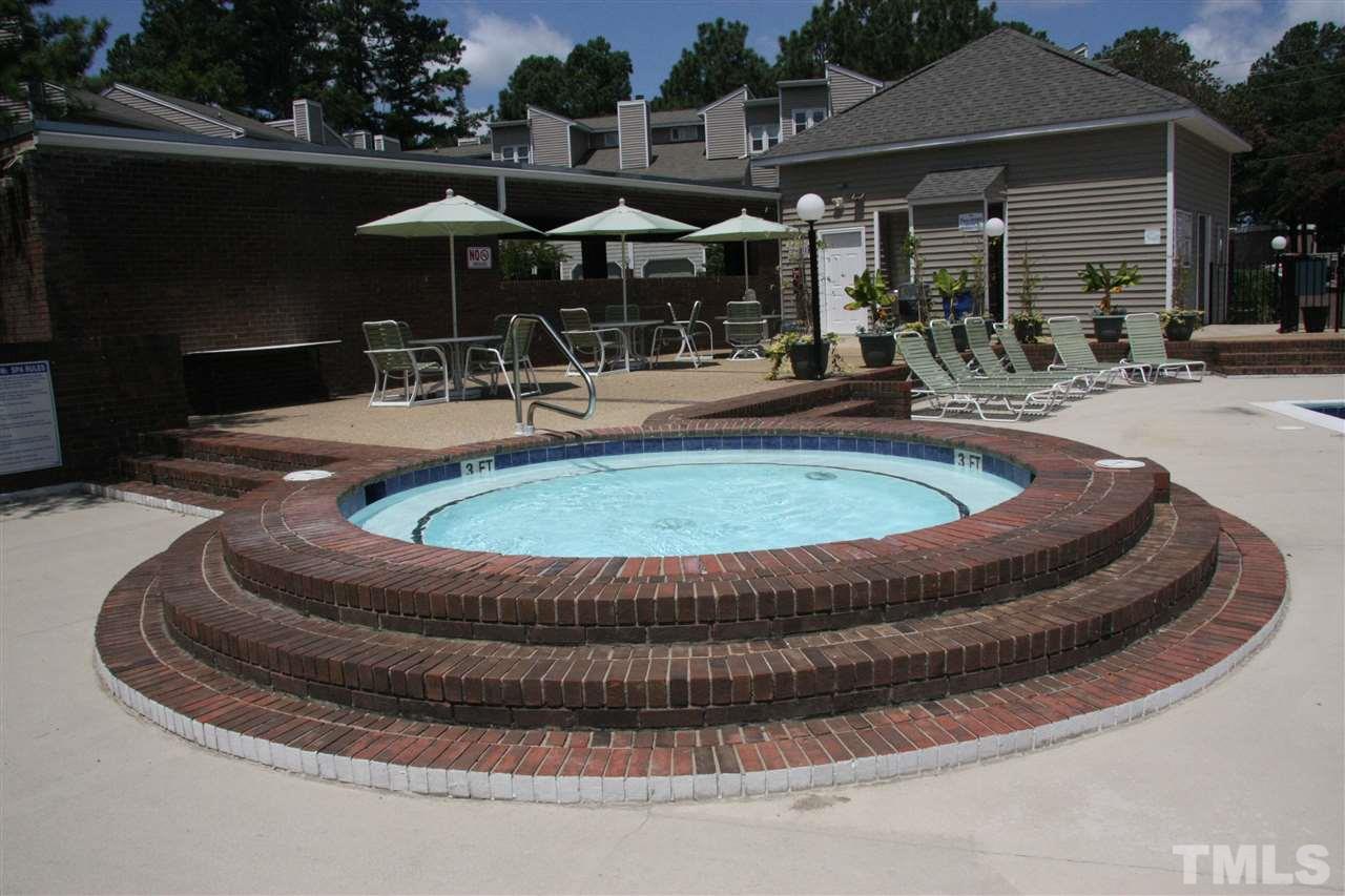 7040 Sandy Forks Road, Unit 105 Raleigh, NC 27615 - Photo 20 of 21 a view of swimming pool with outdoor seating