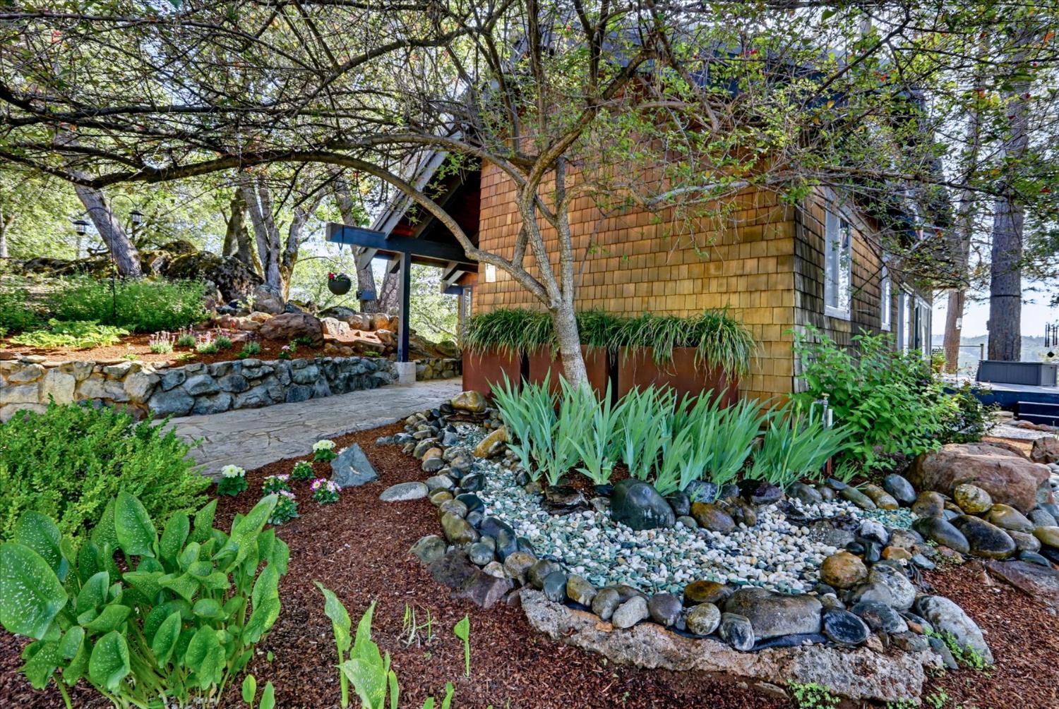 20111 Tanglewood Road Grass Valley, CA 95945 - Photo 76 of 93 a backyard of a house with lots of green space