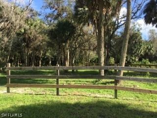 18900 South River Road Alva, FL 33920 - Photo 9 of 15 a garden view with a fountain