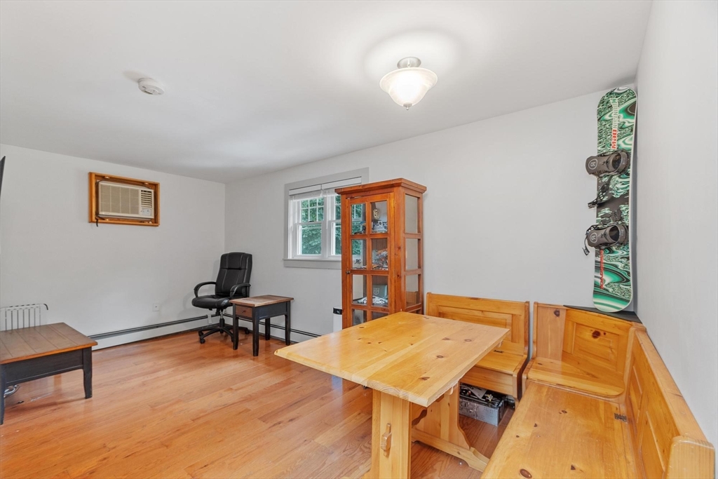 241 Reservoir Road Lunenburg, MA 01462 - Photo 36 of 40 a view of a workspace with furniture