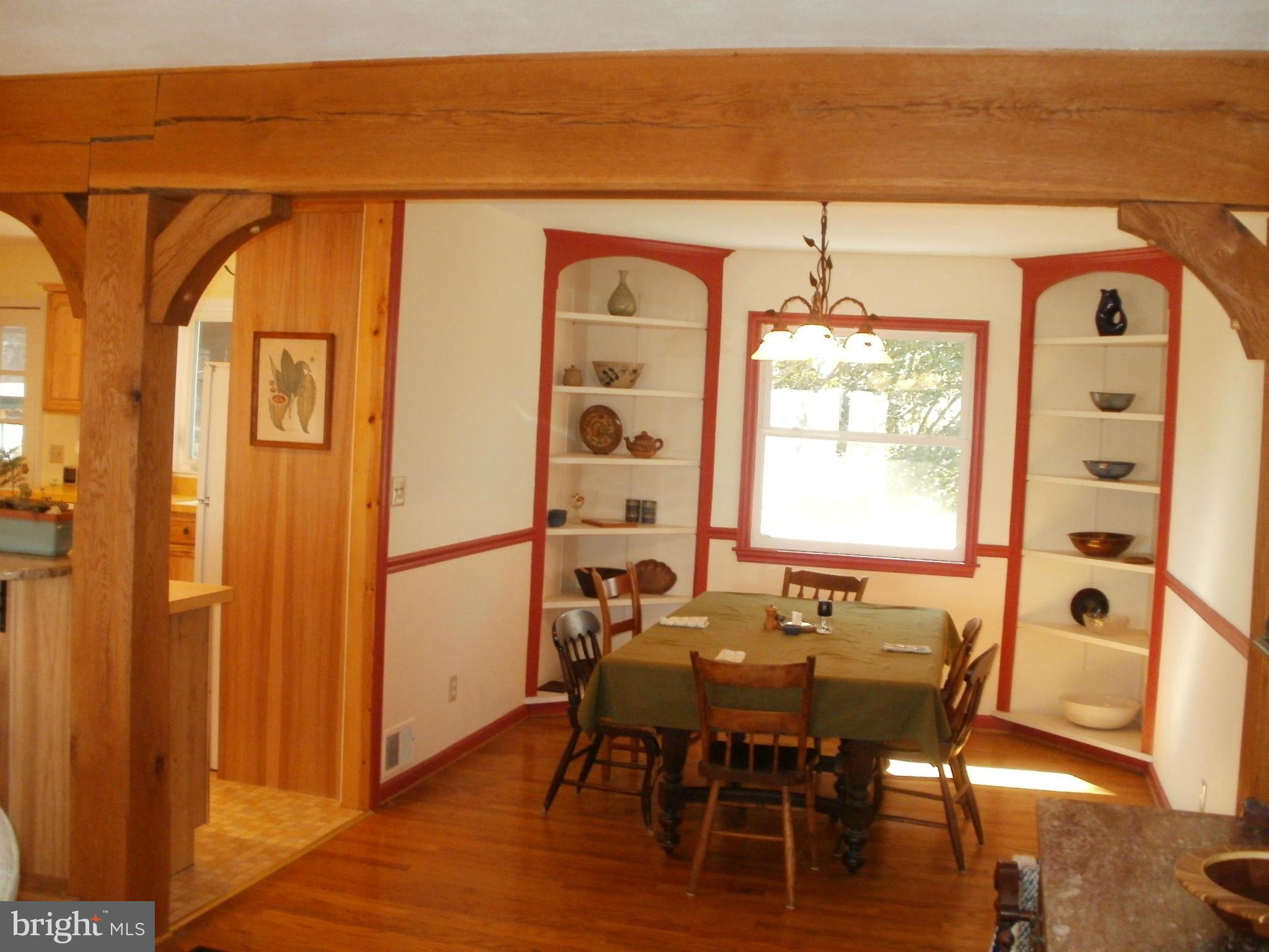 17957 Trossbach Road Dameron, MD 20628 - Photo 5 of 30 a view of a dining room with furniture and chandelier