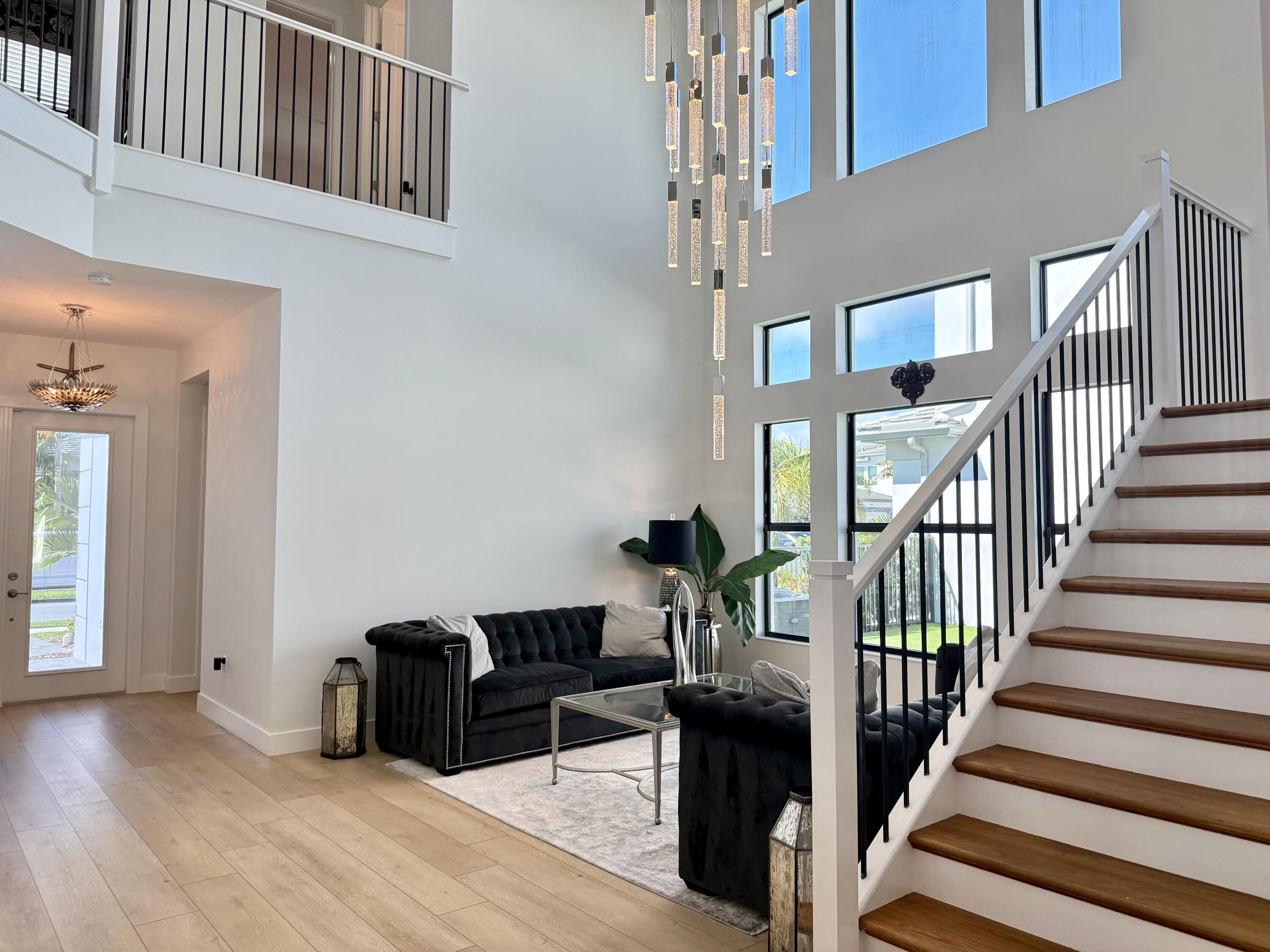 17645 Sparkling River Road Boca Raton, FL 33496 - Photo 20 of 36 Living Room Stairs