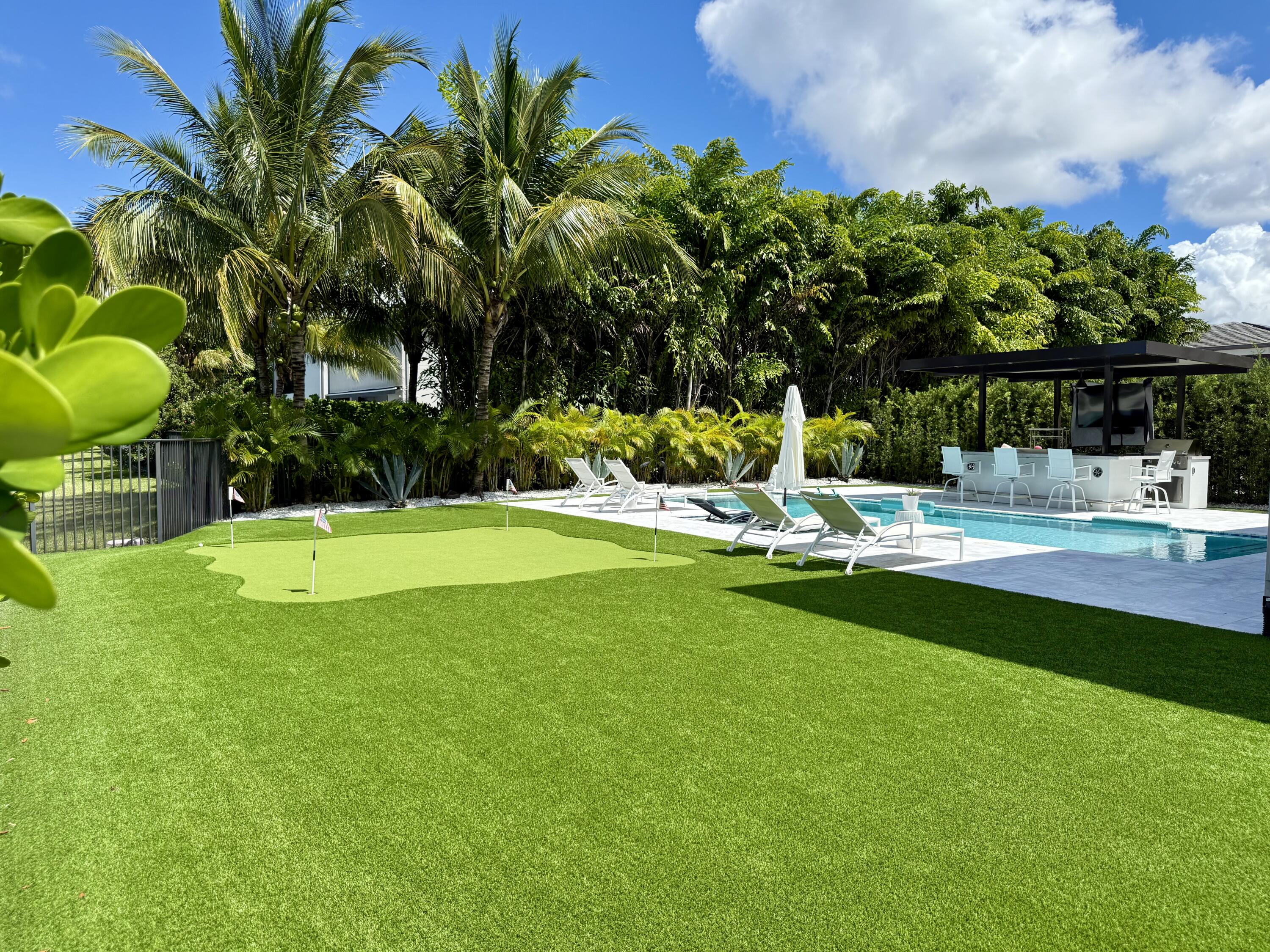 17645 Sparkling River Road Boca Raton, FL 33496 - Photo 31 of 36 SIde Yard Putting Green