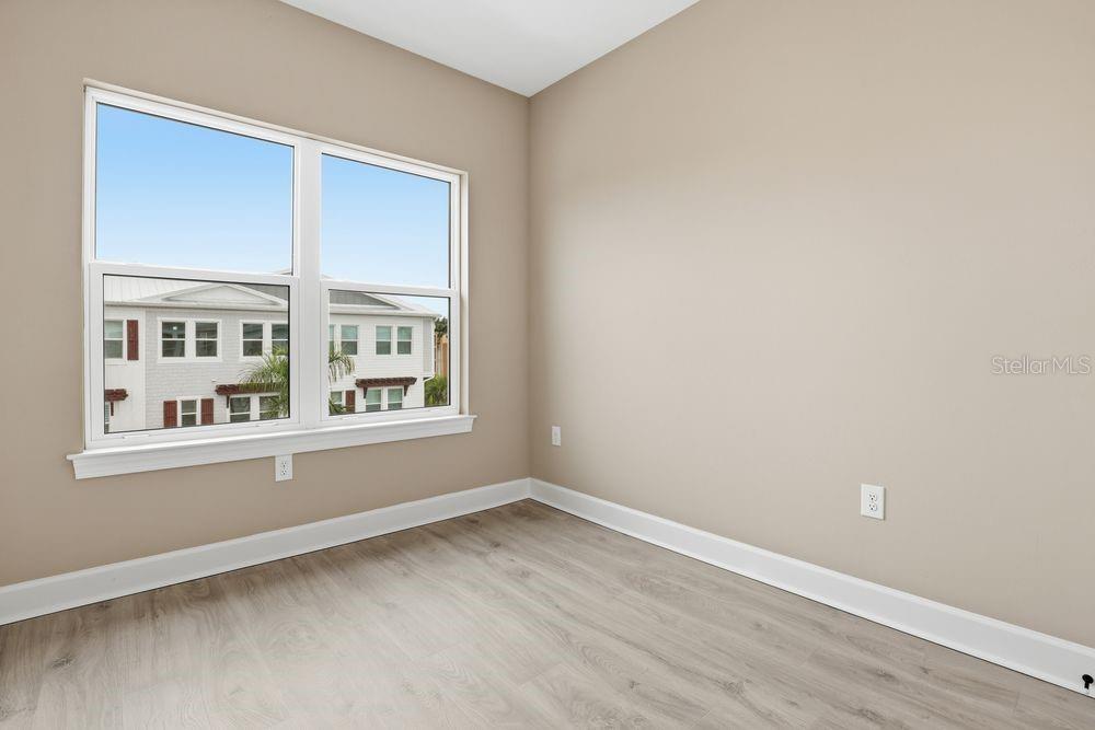 1624 Compass Pointe Court, Unit 203 Punta Gorda, FL 33950 - Photo 18 of 44 a view of an empty room with a window