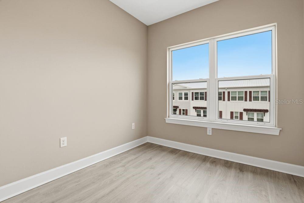 1624 Compass Pointe Court, Unit 203 Punta Gorda, FL 33950 - Photo 19 of 44 a view of an empty room with a window