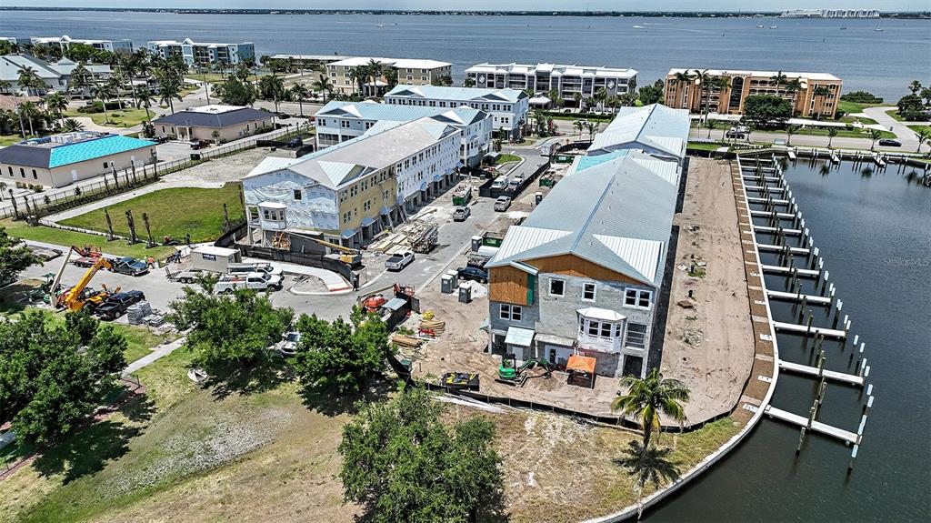 1624 Compass Pointe Court, Unit 203 Punta Gorda, FL 33950 - Photo 39 of 44 an aerial view of multiple houses