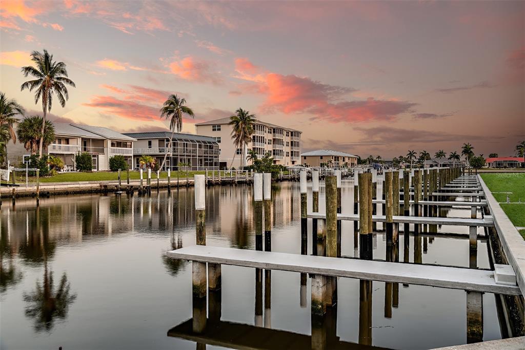 1624 Compass Pointe Court, Unit 203 Punta Gorda, FL 33950 - Photo 44 of 44 a view of a lake with a terrace