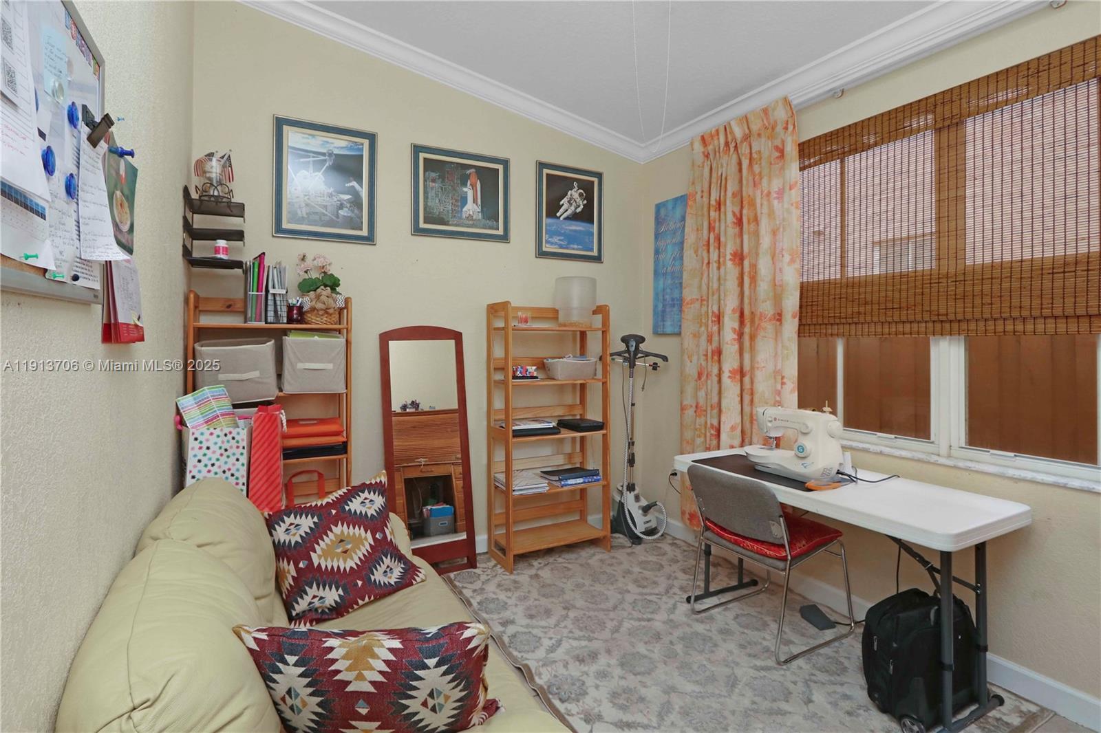 15382 Southwest 16th Terrace Miami, FL 33185 - Photo 12 of 26 a living room with furniture a rug and a window