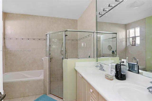 a bedroom with a bed and furniture